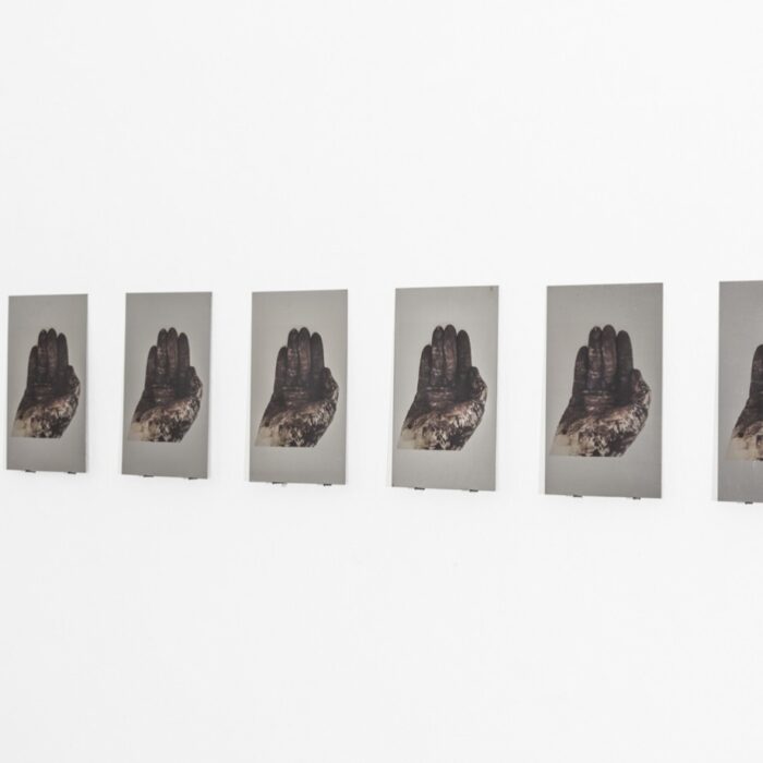 Seven Hands, 2014, prints on iron plates, 36x21,5 cm. Installation view at Fondazione Mudima, Milano Seven Hands, 2014, prints on iron plates, 36x21,5 cm. Installation view at Fondazione Mudima, Milano